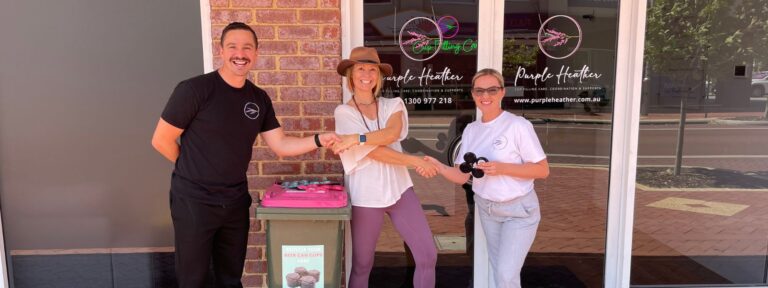 Founders of Purple Heather with Sharka from Donut Waste, holding clips infront of their offices